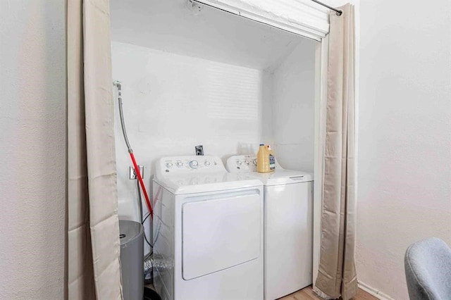 laundry room with laundry area and washing machine and dryer