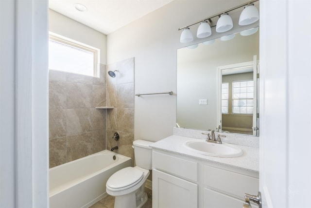 bathroom featuring shower / washtub combination, vanity, and toilet