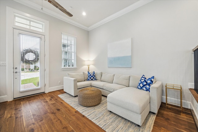 living room featuring baseboards, a ceiling fan, hardwood / wood-style flooring, ornamental molding, and recessed lighting