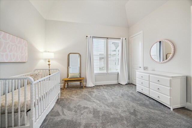 bedroom featuring vaulted ceiling, carpet, and baseboards