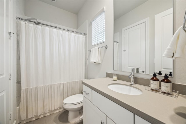 bathroom featuring shower / bath combination with curtain, vanity, and toilet