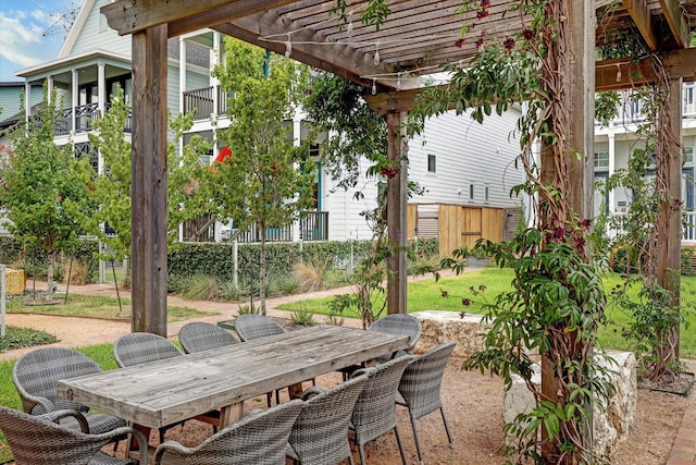 view of patio / terrace with outdoor dining area and a pergola