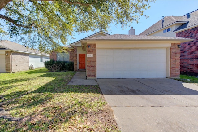 ranch-style house featuring an attached garage, brick siding, concrete driveway, a chimney, and a front yard