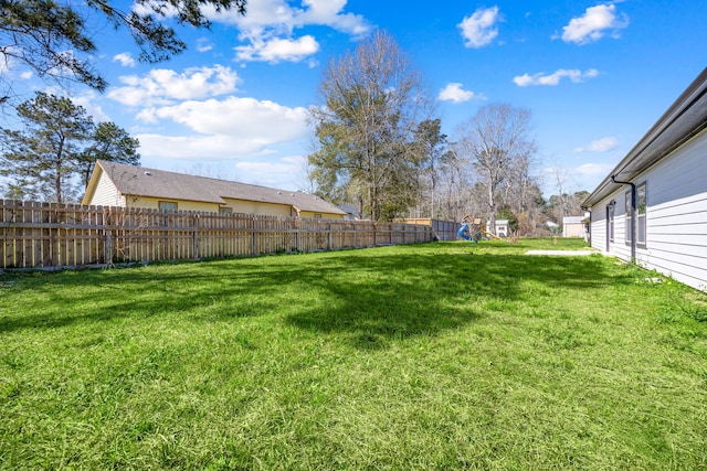 view of yard with fence