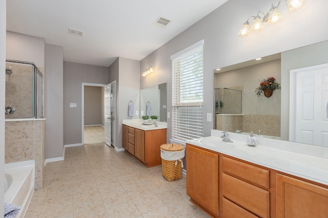 full bath featuring a garden tub, vanity, visible vents, baseboards, and a tile shower