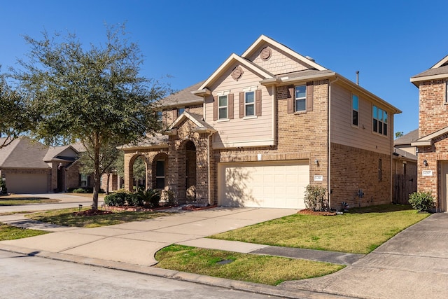 view of front of house with a garage, concrete driveway, brick siding, and a front yard