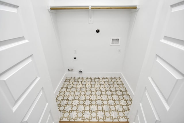 clothes washing area featuring baseboards, gas dryer hookup, tile patterned floors, hookup for a washing machine, and hookup for an electric dryer