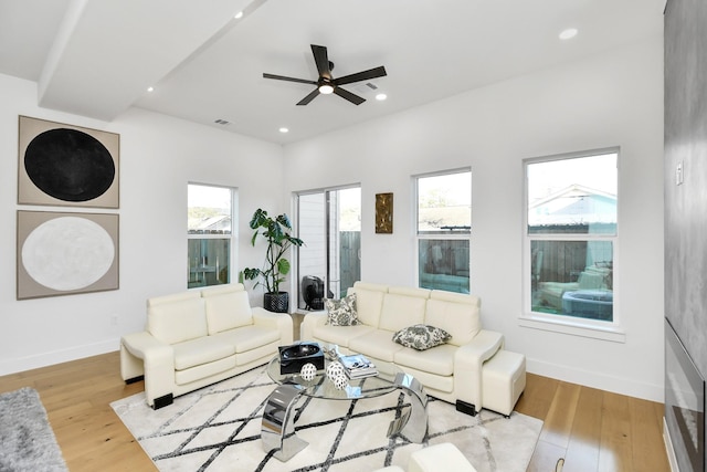 living room with ceiling fan, recessed lighting, wood finished floors, and baseboards