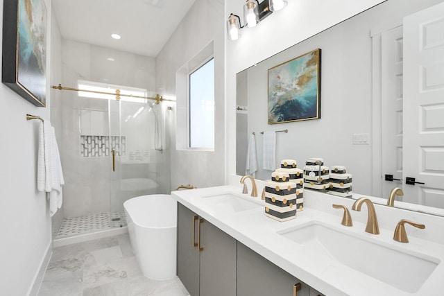 full bathroom featuring marble finish floor, a sink, a shower stall, and double vanity