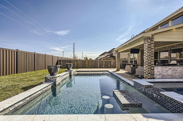 view of pool featuring a fenced backyard, a fenced in pool, and a patio