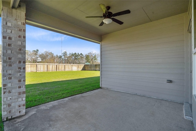 view of patio / terrace with a fenced backyard and ceiling fan