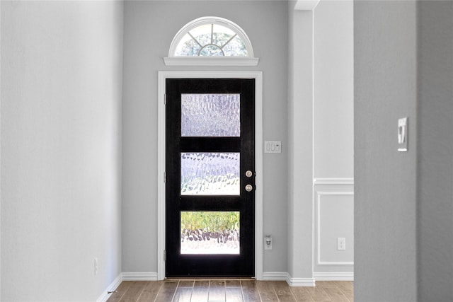 foyer featuring a healthy amount of sunlight and light wood-style flooring