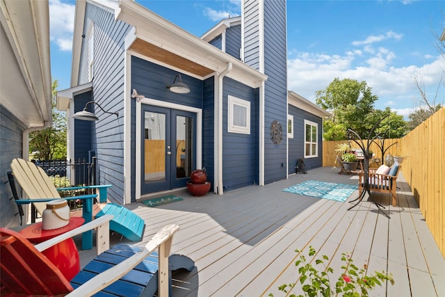 wooden deck with french doors and fence