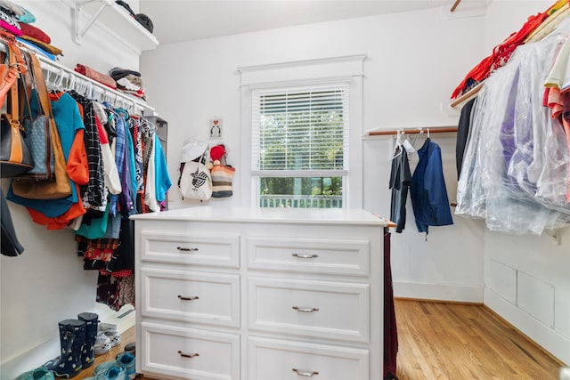 walk in closet featuring light wood-style floors