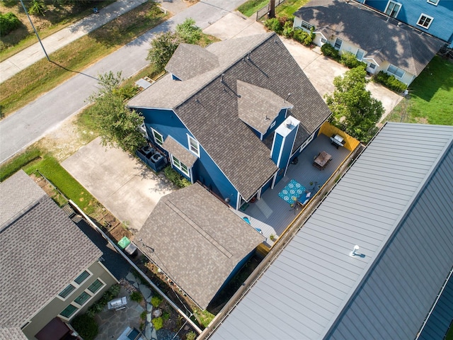 birds eye view of property with a residential view