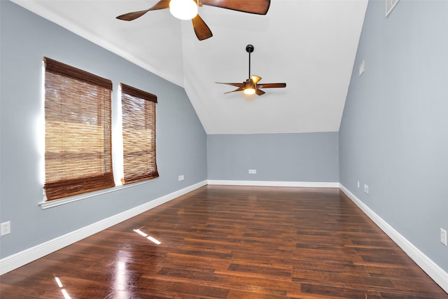 additional living space with vaulted ceiling, ceiling fan, wood finished floors, and baseboards