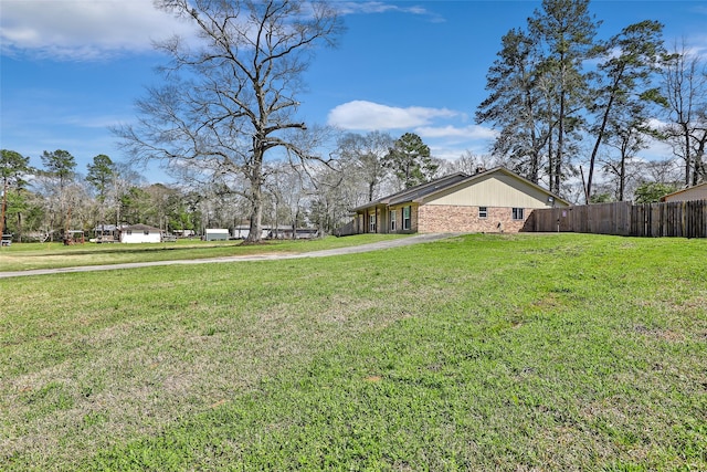 view of yard featuring fence