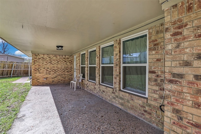 view of patio with fence