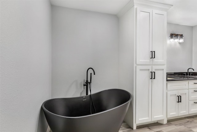 interior space with a freestanding bath and vanity