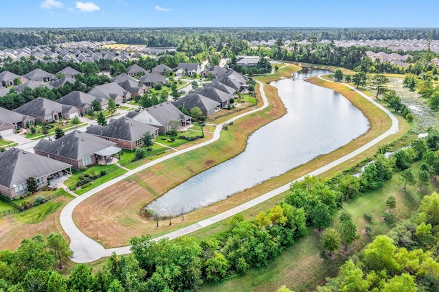 bird's eye view with a water view and a residential view