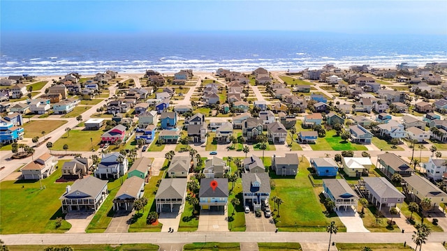 aerial view featuring a residential view and a water view