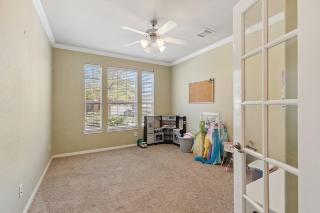 rec room featuring baseboards, visible vents, carpet, crown molding, and french doors