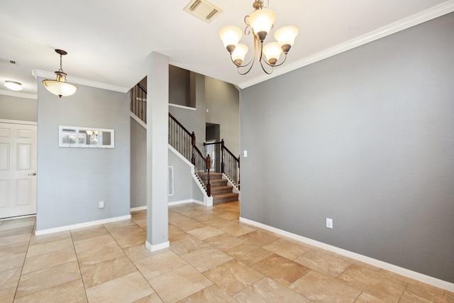 spare room with baseboards, stairs, visible vents, and crown molding