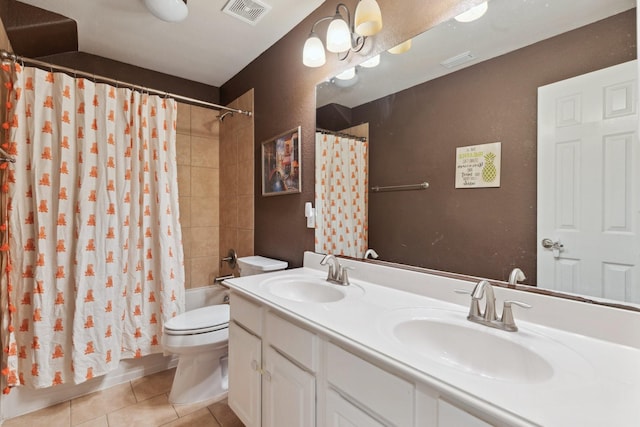 full bath featuring visible vents, a sink, toilet, and tile patterned floors