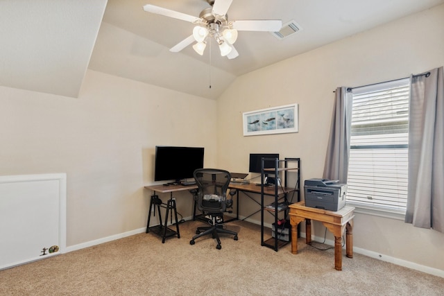 home office featuring lofted ceiling, carpet flooring, visible vents, and baseboards