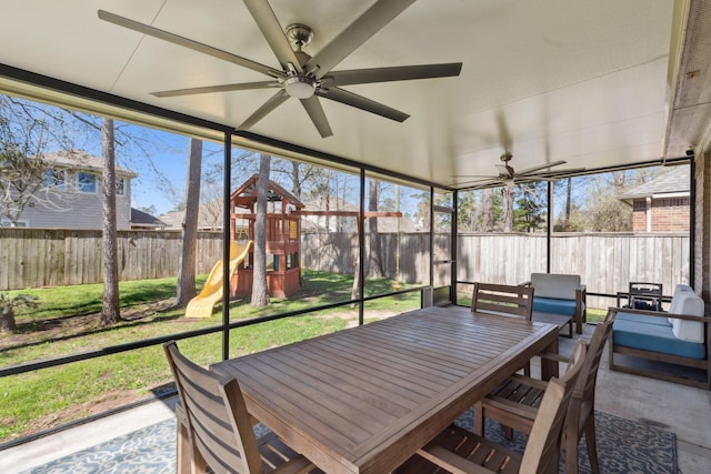 sunroom with plenty of natural light and ceiling fan