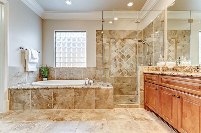 bathroom featuring recessed lighting, vanity, a shower stall, a bath, and crown molding