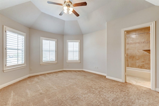 unfurnished room featuring a healthy amount of sunlight and light colored carpet