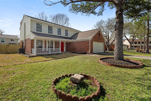 traditional home with driveway, covered porch, fence, a front lawn, and brick siding