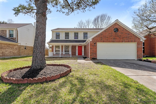 traditional-style house featuring brick siding, covered porch, a garage, driveway, and a front lawn