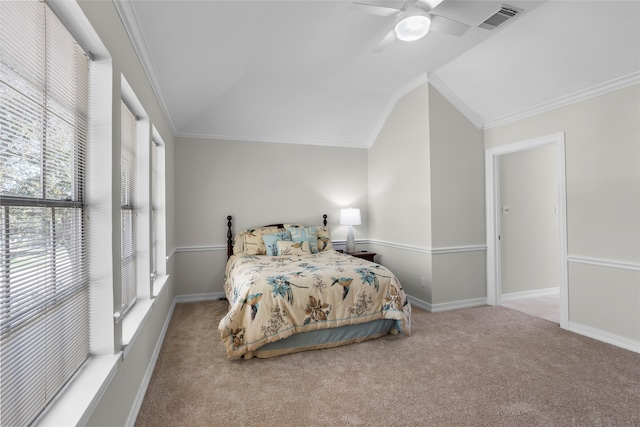 bedroom with lofted ceiling, carpet floors, visible vents, and crown molding