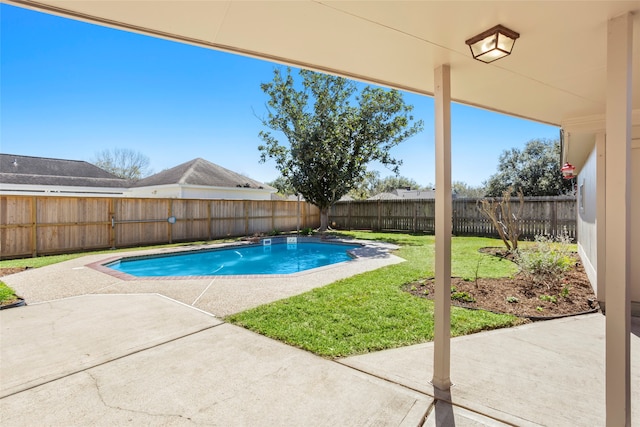 view of swimming pool featuring a patio area, a fenced backyard, a fenced in pool, and a lawn