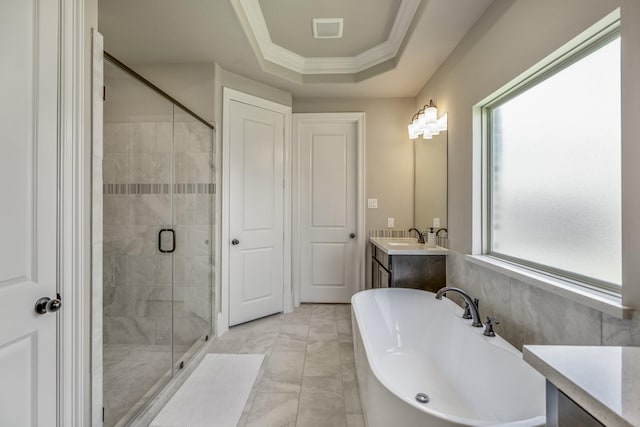 bathroom with vanity, visible vents, marble finish floor, a shower stall, and a raised ceiling