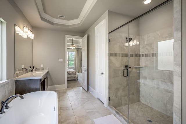 ensuite bathroom with ensuite bathroom, vanity, ornamental molding, a soaking tub, and a stall shower