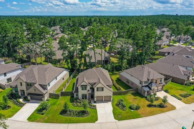 aerial view with a forest view and a residential view