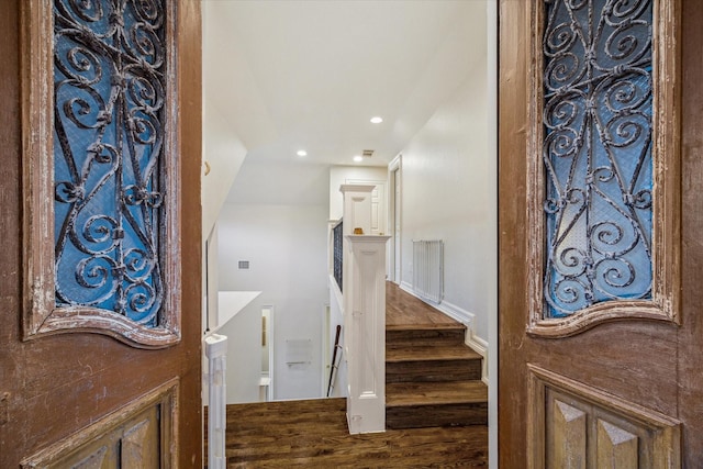 foyer entrance featuring recessed lighting and wood finished floors