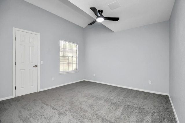 carpeted empty room with a ceiling fan and baseboards