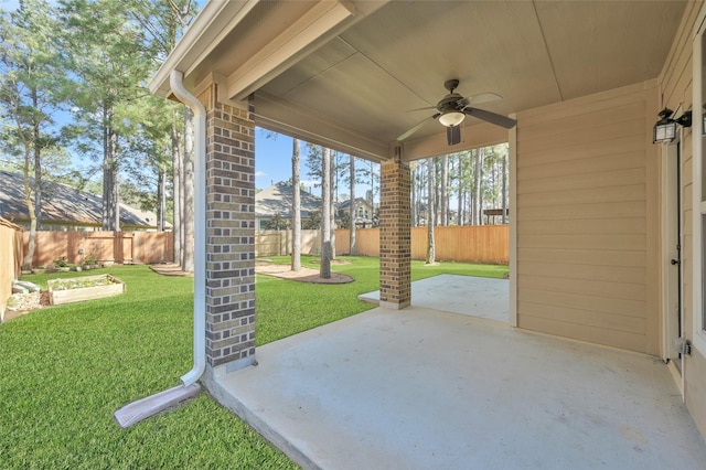 view of patio / terrace with ceiling fan and a fenced backyard