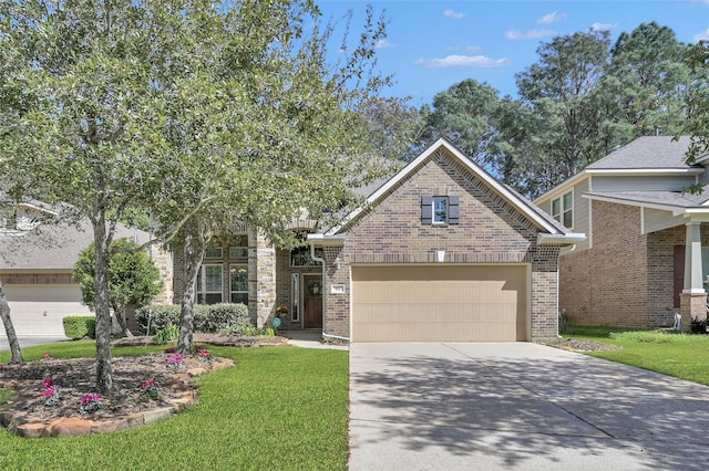 view of front of home featuring driveway, brick siding, an attached garage, and a front yard