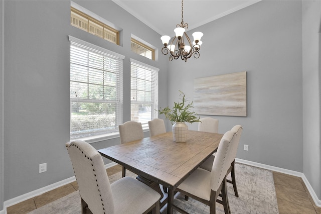 dining space with light tile patterned floors, plenty of natural light, and baseboards