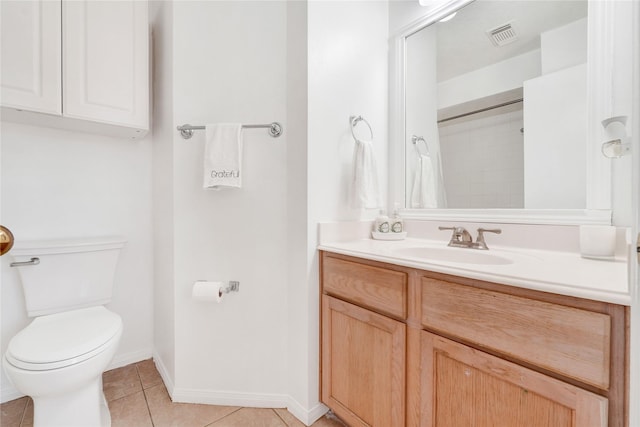 bathroom with visible vents, baseboards, toilet, tile patterned floors, and vanity