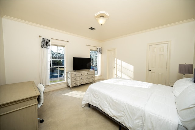 bedroom with ornamental molding, light carpet, and visible vents