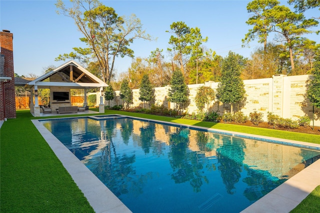 view of swimming pool with a gazebo, a patio area, a fenced backyard, and an outdoor living space