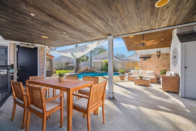 view of patio / terrace featuring a fenced in pool, outdoor dining space, ceiling fan, a fenced backyard, and an outdoor living space