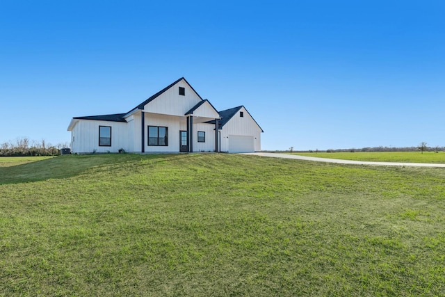 modern inspired farmhouse featuring a front lawn