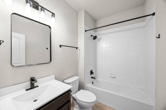 full bath with toilet, tile patterned floors, bathtub / shower combination, and vanity